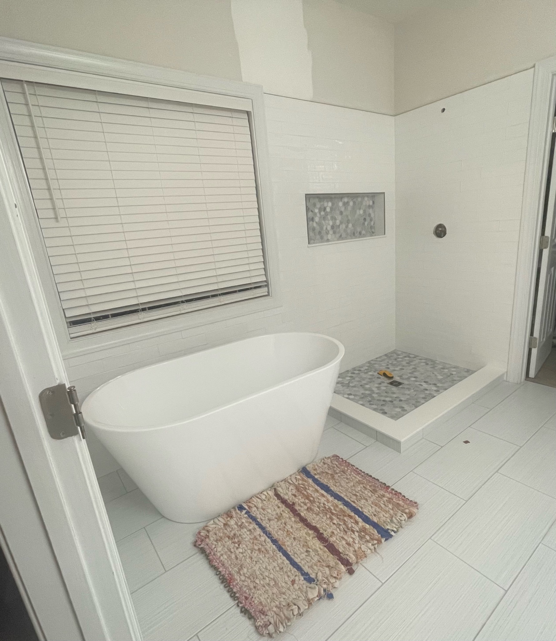 Custom white tile bathroom and shower