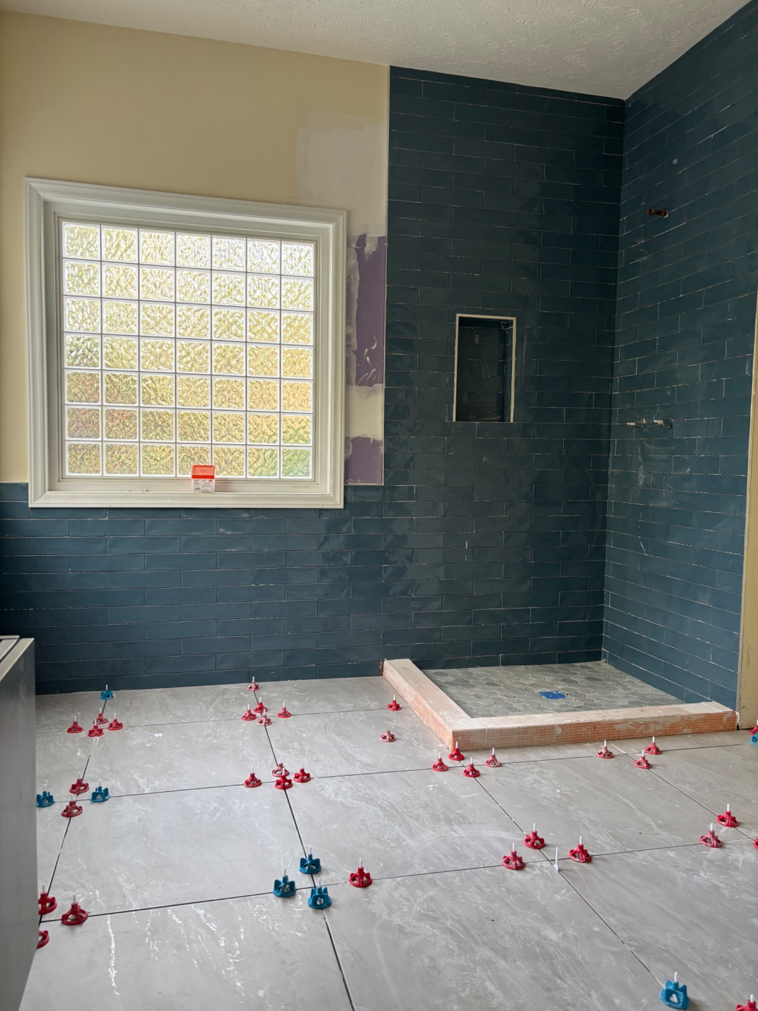 Blue tile bathroom installation